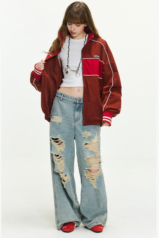 Jean femme oversize délavé à déchirures, coupe large et longue style streetwear tendance