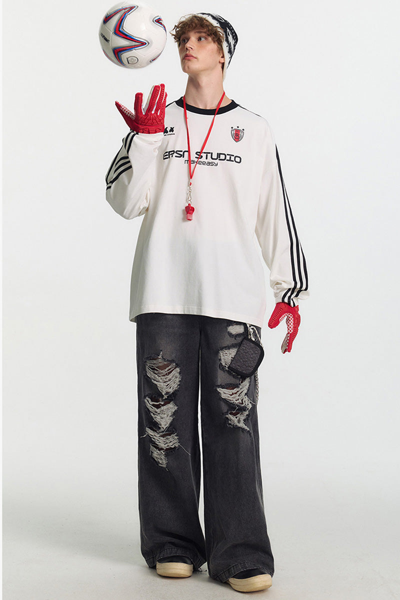 Jean femme oversize délavé à déchirures, coupe large et longue style streetwear tendance