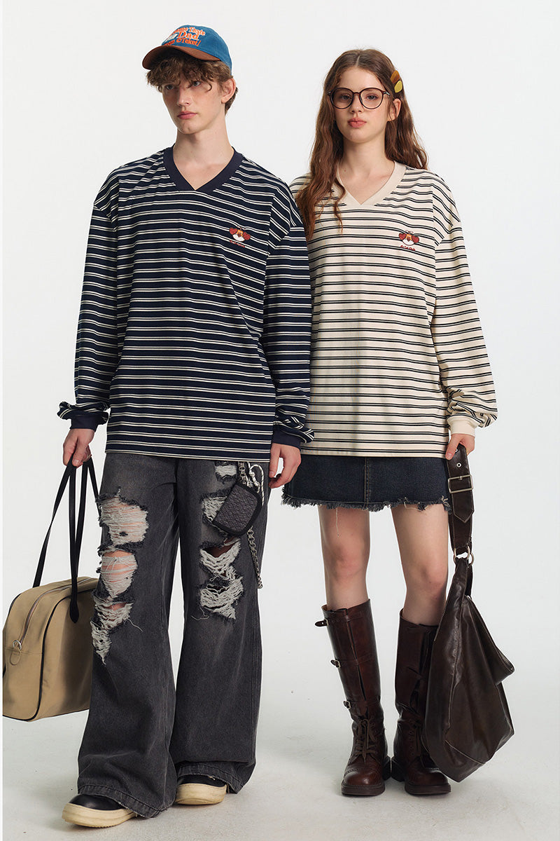 Jean femme oversize délavé à déchirures, coupe large et longue style streetwear tendance
